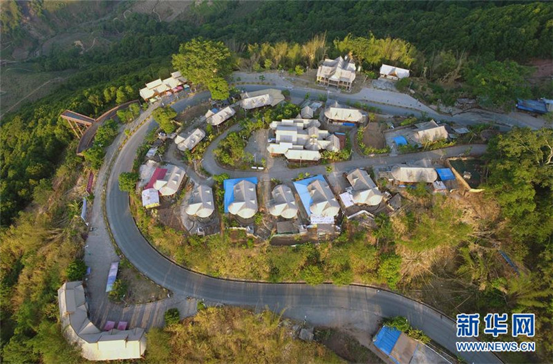 6.云南省西盟佤族自治县勐梭镇秧洛村到周边山村和县城的公路（2019年5月28日无人机拍摄）。 新华社记者 杨宗友 摄.jpg